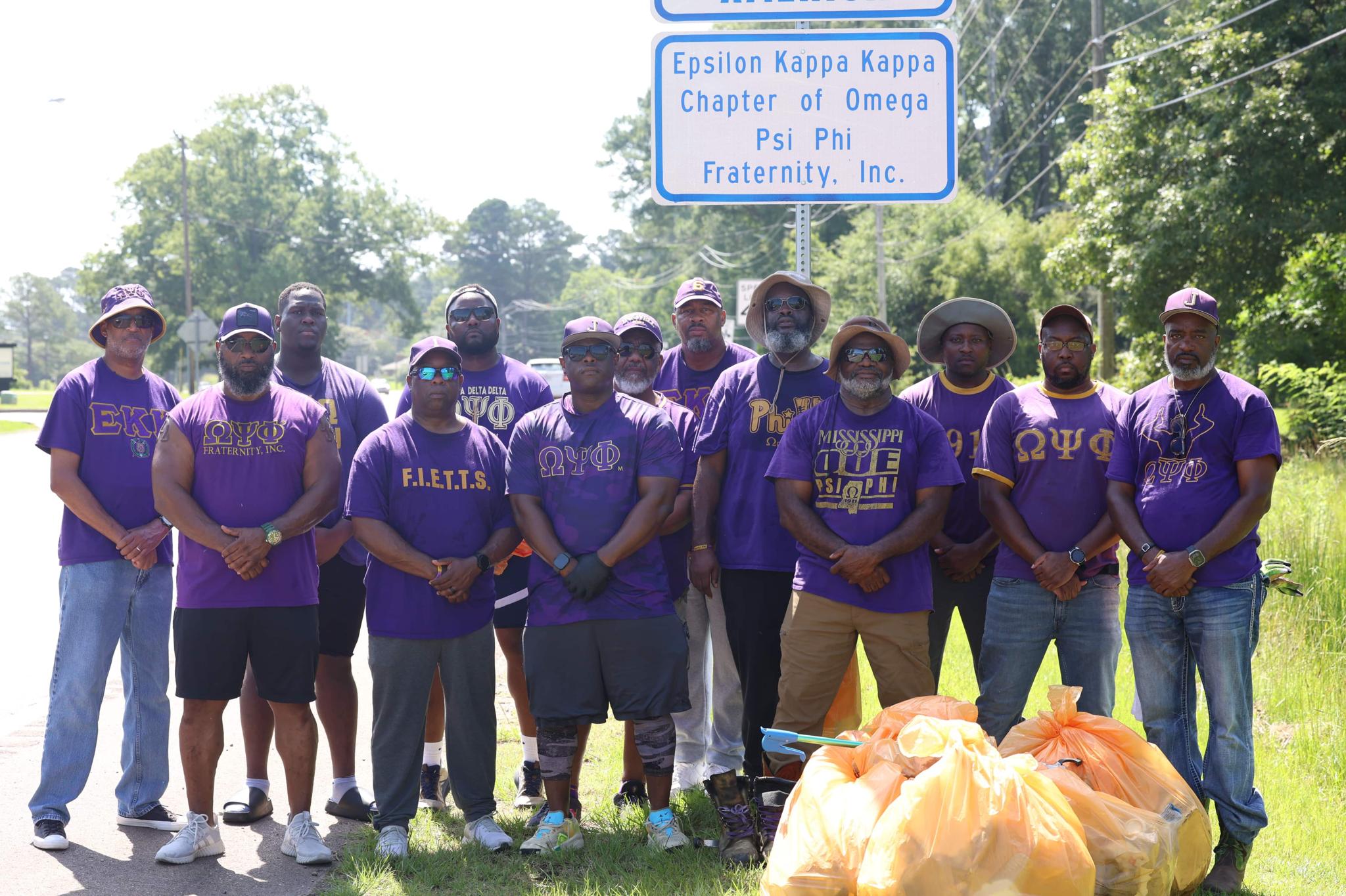 Volunteers at adopt-a-highway road cleanup